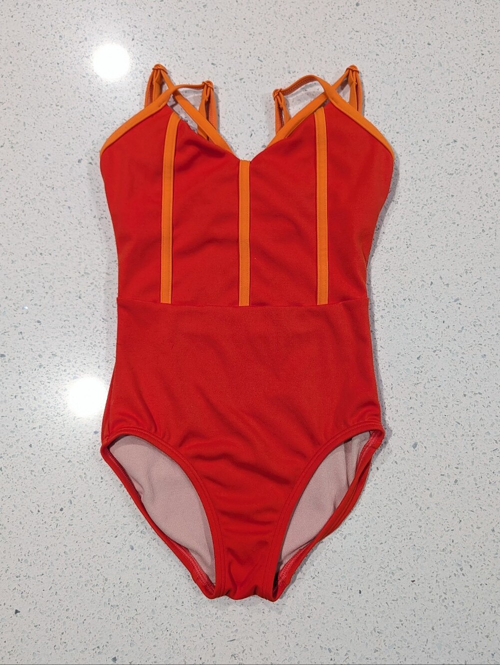 Girls Orange Red Dance Leotard with Strappy Accents